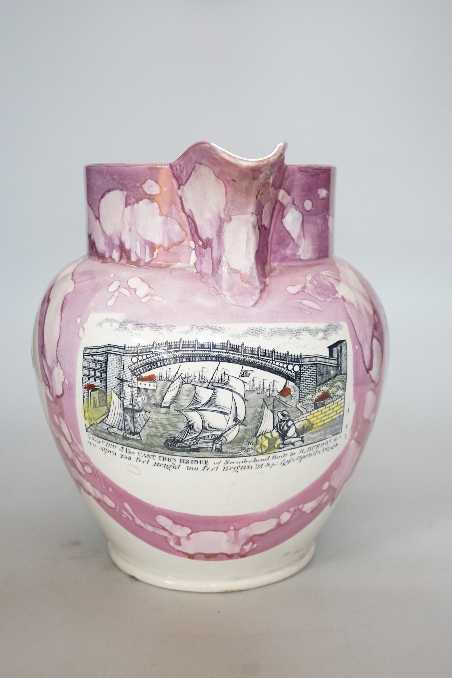 A large Sunderland pink lustre jug of The Iron Bridge, height 25cm